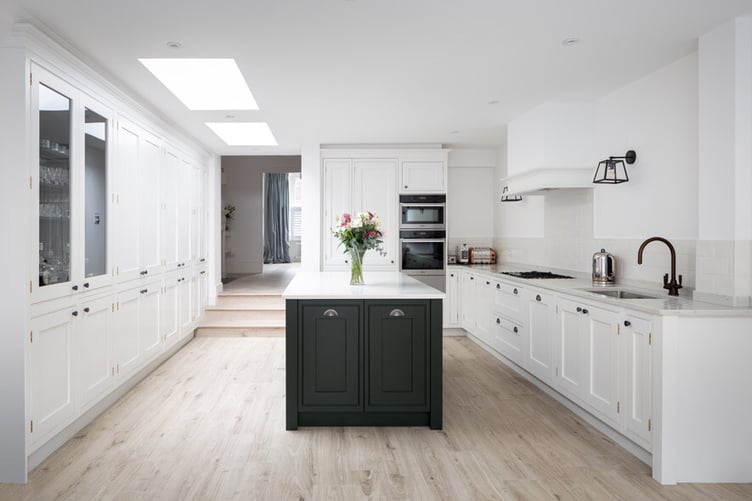 perfect kitchen island that has integrated appliances, made bespoke to measure